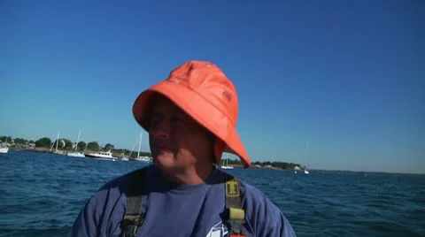Lobsterman rowing in harbor Stock Footage 8912440