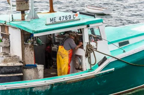 Lobsterman working throttle Stock Photos