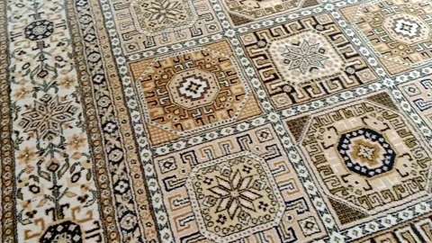 Local and authentic hand-knitted rug background. Stock Footage 273865838