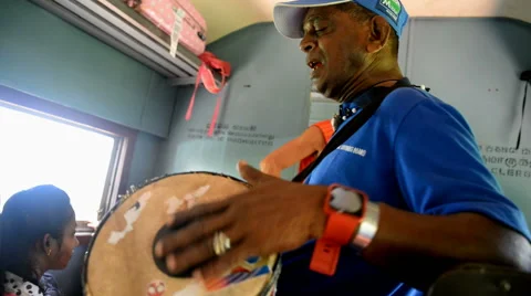 Local artist singing in the train between Colombo and Negombo Stock Footage 50635578