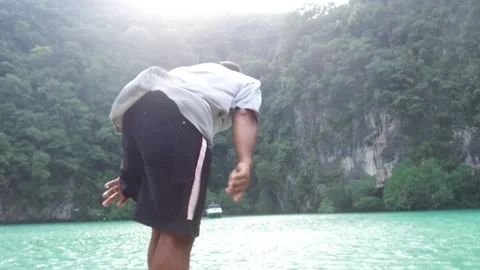 Local Boat Guide anchoring in Koh Hon Island, Krabi, Thailand Stock Footage 130707423