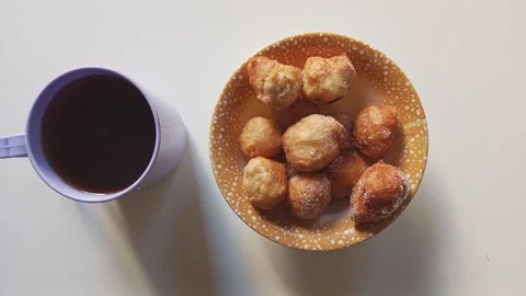 Local Breakfast with Puff Puff and Black Tea Kano, Nigeria 2K 動画素材 320079869