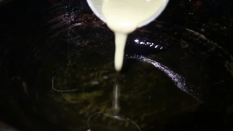 Local cake frying in oil without sound. Stock Footage 105477732