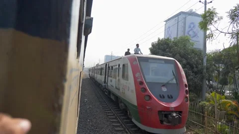 Local commuter train passing by on the railtracks Video stock 153123709