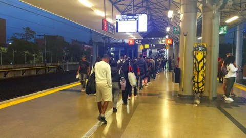Local Commuters Queueing on Elevated Metro Station Platform Area Stock Footage 345724313