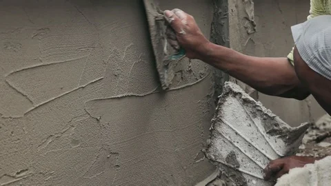 Local Construction Worker Plastering Cement on the Wall. Slow Motion 库存影片 119468696