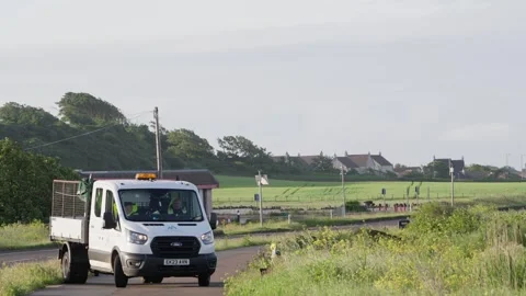 Local Council Workers Taking Break inside Van on quiet Coastal Road Video stock 342546188