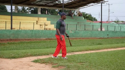 Local Cubans playing Baseball Coach Teaching Kids On A Field In Baracoa Cuba Stock Footage 93490381