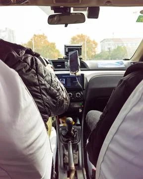 Local e hailing viewed from back seat Stock Photos