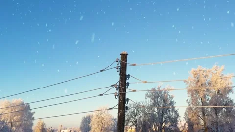 Local electric pole covered with ice and snow. Concept of electricty and Stock Footage 247942851