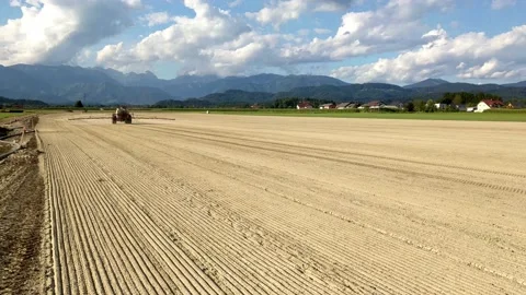 Local farmer spraying the field with non toxic chemicals. Stock Footage 137667789