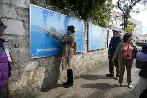 Local guide explaining map of Hvar Stock Photos