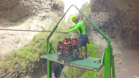 Local Guide Taking Equipment Back To Base Stock Footage 88338267
