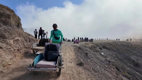 Local Human Powered Trolley Service At Ijen Crater Stock Footage 345199021