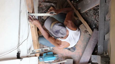 Local Indonesian Carpenter at Work on a Staircase Stock Footage 43672510