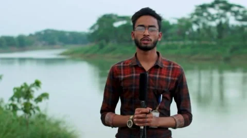A local journalist is reporting the news Stock Footage 296525412