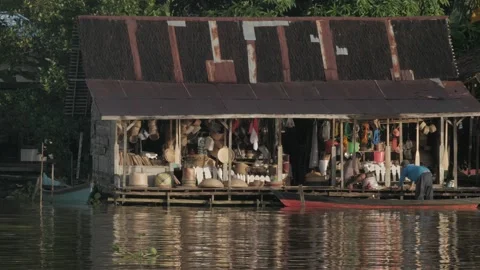Local made supplies and accesories for sale at floating shop Stock Footage 135953653