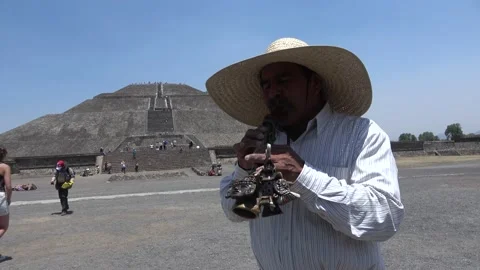 Local Man Plays Native American Flute At Teotihuacan, Mexico City Stock Footage 154561594
