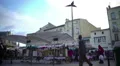 Local market near ancient Bordeaux cathedral in France, urban life, tourism HD Footage