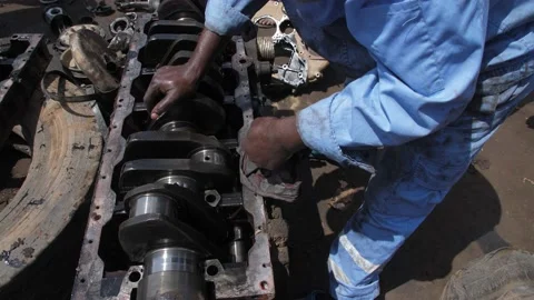 Local Mechanic Is Checking and repairing the engine of cars and truck Видео 156421489