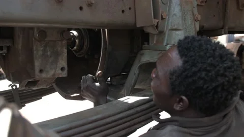 Local Mechanic Is Checking and repairing the engine of cars and truck Видео 156422100