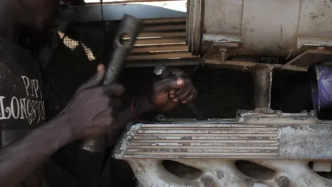 Local Mechanic Is Checking and repairing the engine of cars and truck Stock Footage 156422948
