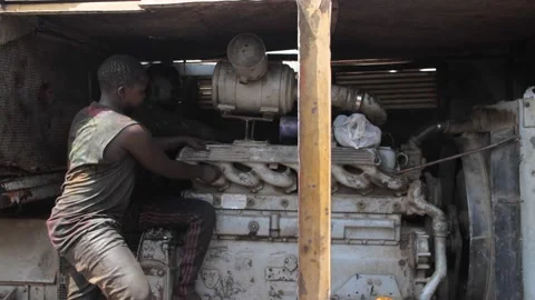 Local Mechanic Is Checking and repairing the engine of cars and truck Stock Footage 156777005
