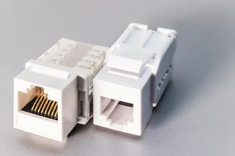 Local network socket against gray background. Power outlet Photos