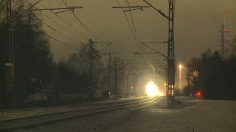 Local passenger train on a snowy night Stock Footage 10787901
