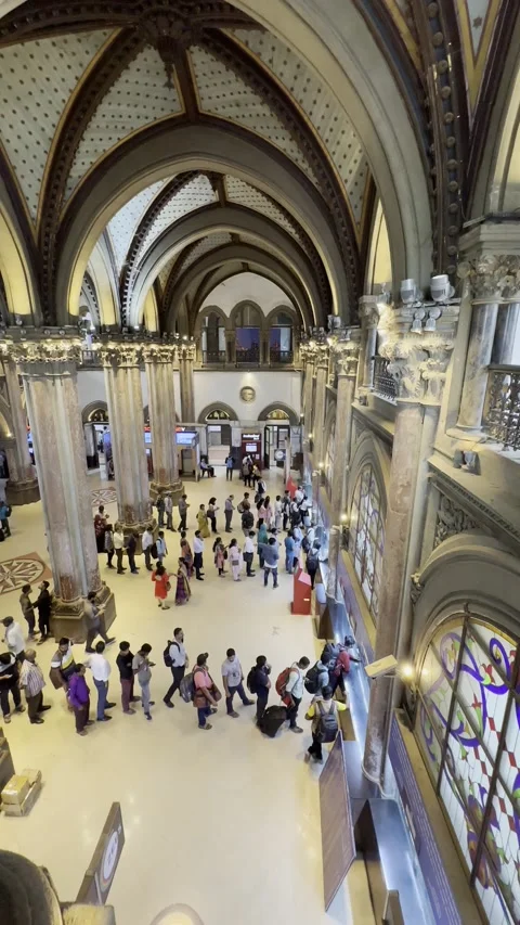 Local Passengers are in Queue for a Local train ticket at CST Station Mumbai. Stock Footage 236083981