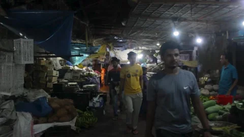 The local people are walking through the market Stock Footage 296526201
