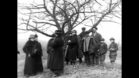 Local people attend a sugaring party, eating maple syrup poured on snow in 1925. Stock Footage 85771815