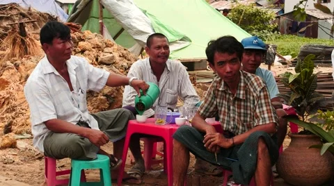 Local people drinking tea and eat outdoors closeup - Myanmar Stock Footage 61450246