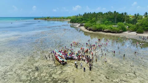 Local People Gathering Around a Stranded Fishing Boat at Low Tide, January 21, Video stock 336896273