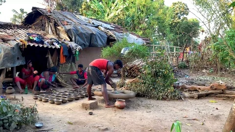Local people making the  earthenware pot in İndia Stock Footage 106711477