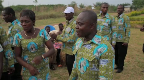 Local people singing and dancing in field, Ghana Stock Footage 62388443