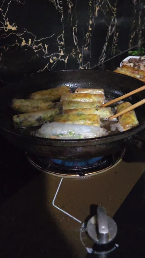 Local Preparing spring rolls in Village – Sapa, VIETNAM – 2024/06/05 Stock Footage 319795256