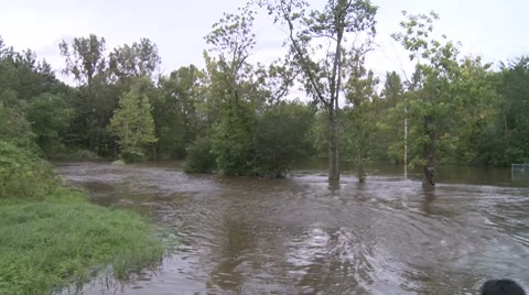A local pub in Newburgh, NY is surrounded by flood waters after Hurricane Irene Stock Footage 8567323
