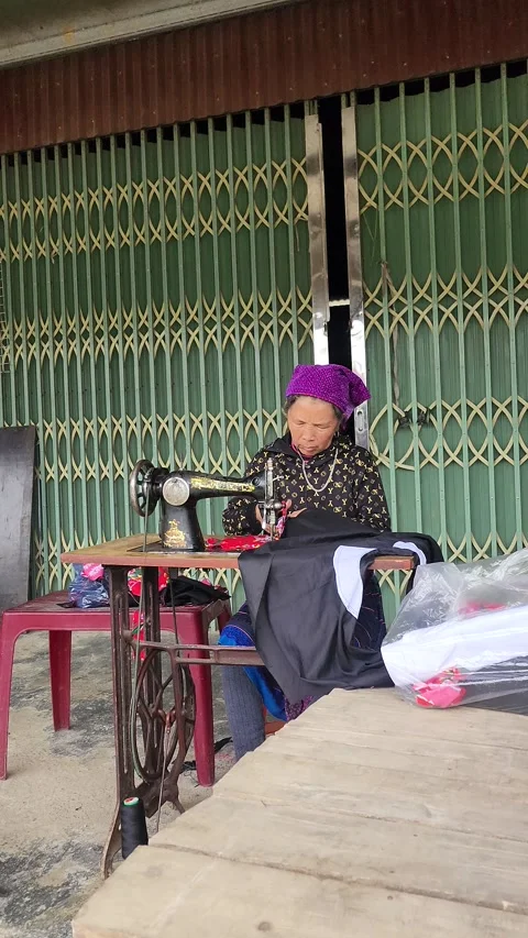 Local Sewing using Machine Close-Up – Sapa, VIETNAM – 2024/06/06 Stock Footage 319795578