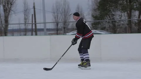 Local team is playing training ice hockey match slow motion hand shake shot Stock-Footage 168921979