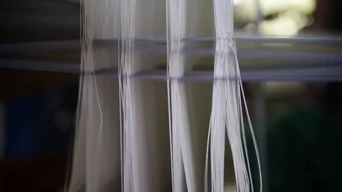 Local Thai artists are sewing with ancient instruments Weaving machine Stock Footage