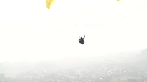 Local tourists enjoy skydiving Stock Footage 296280682