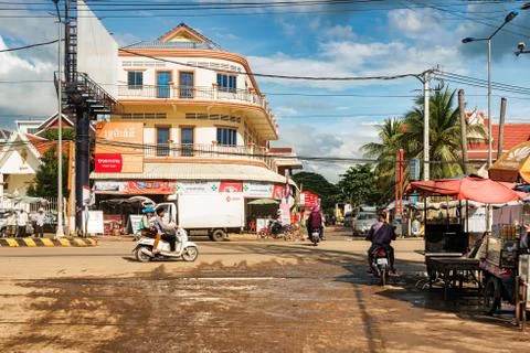 Local traffic on the main road in Kampong Thom, Cambodia. Stock Photos