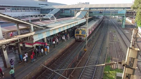 Local train arrives at platform of Andheri Railway Station in Mumbai, India Stock Footage 313214393