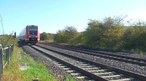 Local train driving by Stock Footage 8979757