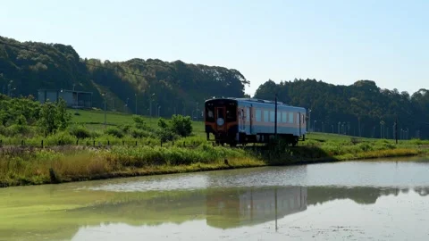 Local Train Passing Tea Fields and Rice Paddies in Fukuroi, Shizuoka, Japan Stock Footage 335741597