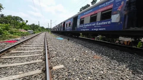 Local Train Passing Through Suburban Area in Kolkata, West Bengal Video stock 312888840