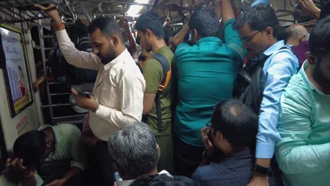 Local train people stand in queue. 4K (Overcrowded). Stock Footage 250954495