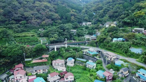 Local Train Tracks Through Mountain Countryside on Cloudy Day Video stock 290342247