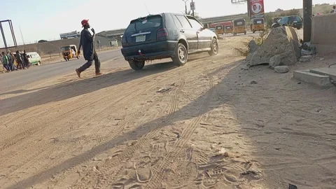 Local U Turn Point On Kano Zaria Road At Sunset Kano Nigeria Stock Footage 325975348